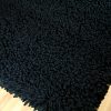 Spiky black rug